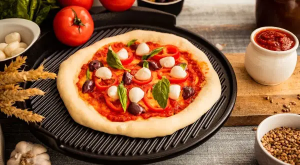 Jak zrobić okrągłą pizzę - uniknij błędów i osiągnij perfekcję