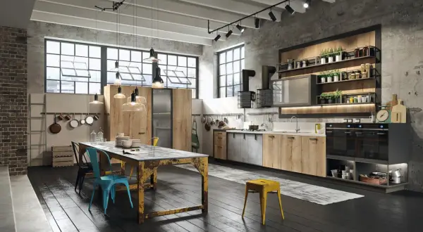 Nowoczesna kuchnia w stylu loft z drewnianymi frontami, betonową ścianą i industrialnymi lampami. Idealne miejsce na wspólne gotowanie.