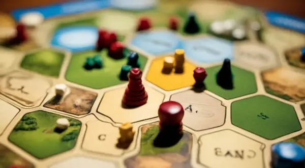 Plansza do gry Catan, pionki i zasady gry.