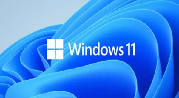 Logo de Windows 11 sobre fondo azul ondulado. Averigua cuanto cuesta instalar Windows 11 y renueva tu sistema.