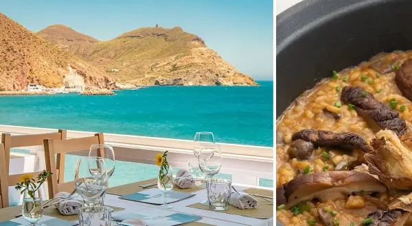 Mesa puesta con vistas al mar en Almería, junto a un plato de arroz con setas, ideal para disfrutar de un delicioso pescado almería.