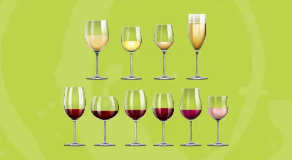 Vari calici di vino bianco e rosso, con bollicine, per illustrare la temperatura ideale dei vini bianchi e rossi.
