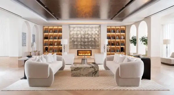 A luxurious living room designed by top interior designers, featuring plush sofas, a modern fireplace, and elegant built-in shelving.