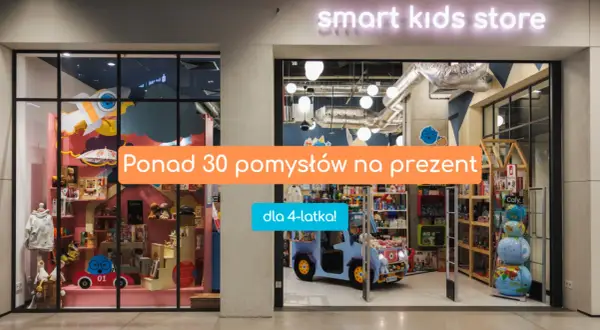 Witryna sklepu z zabawkami "smart kids store" z pomarańczowym napisem "Ponad 30 pomysłów na prezent" i niebieskim "dla 4-latka!".