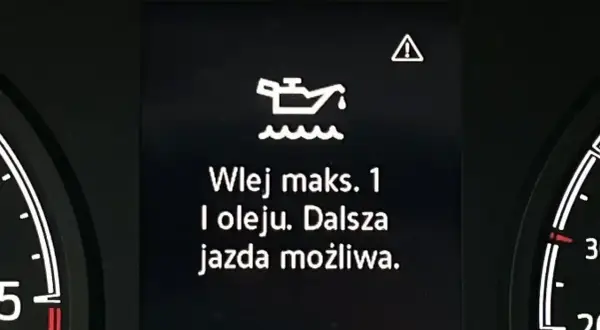 Kontrolka oleju świeci, informując o konieczności dolania maks. 1 litra oleju. Dalsza jazda jest możliwa.