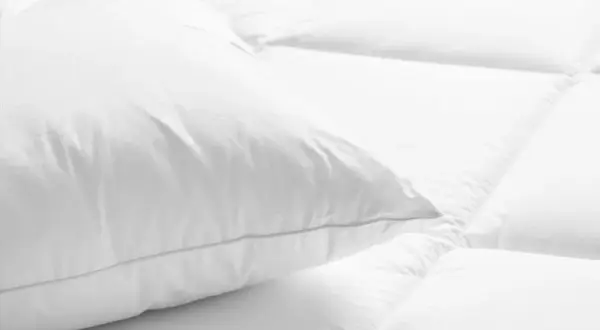 Jakie poduszki są w hotelach? Odtwórz luksus w swojej sypialni