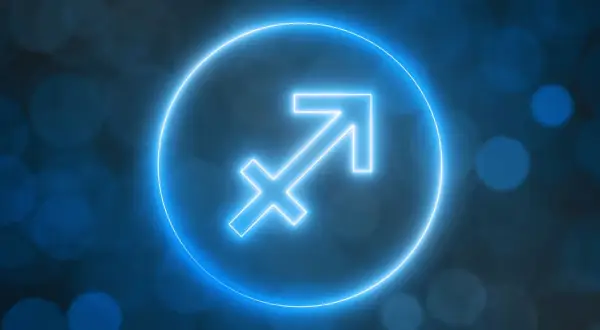 Neonowy symbol Strzelca, kiedyś celny strzał, teraz świeci w ciemności.