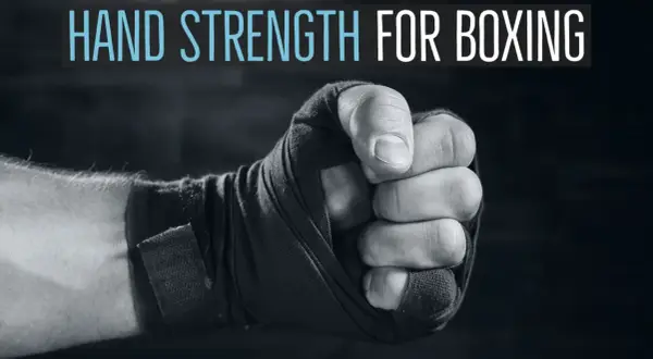 Close-up of a boxer's fist wrapped in tape, with text "HAND STRENGTH FOR BOXING" above. Learn how to strengthen wrists for boxing.