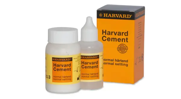 Harvard Cement - najmocniejszy cement stomatologiczny w zestawie z pudełkiem i buteleczkami.