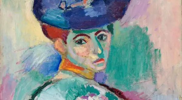 A portrait in the vibrant Henri Matisse art style, featuring bold colors and expressive brushstrokes. A woman with a large blue hat gazes forward.