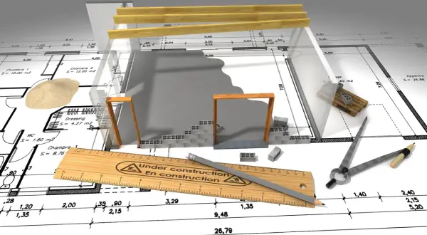 Budowa domu bez kredytu a urząd skarbowy: plan, materiały budowlane i narzędzia na tle projektu.