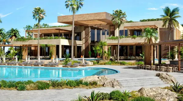 Luksusowy hotel z basenem i palmami, idealny na wypoczynek w stylu jaz Marsa Alam.