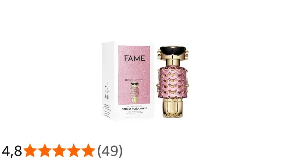 Paco Rabanne Fame Blooming Pink – złoty flakonik perfum w kształcie robota z różowymi łuskami i czarnymi okularami, obok pudełko.