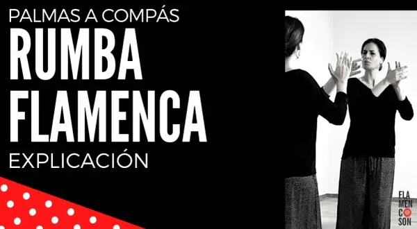 Una mujer practica cómo bailar rumba flamenca frente a un espejo, con las palmas de las manos levantadas.