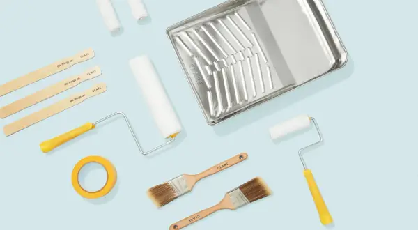 Paint rollers, brushes, a tray, tape, and stir sticks are what you need to paint a room.