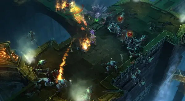 Intensywna bitwa w Diablo 3. Gracze walczą z hordami potworów na płonących platformach. Sprawdź diablo 3 wymagania, by dołączyć do walki!
