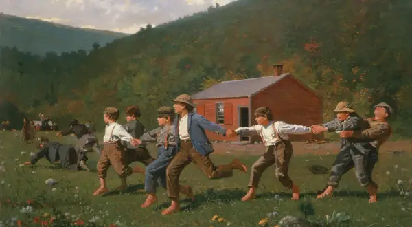 Boys playing "Snap the Whip" in a field in front of a red schoolhouse, with rolling hills in the background.