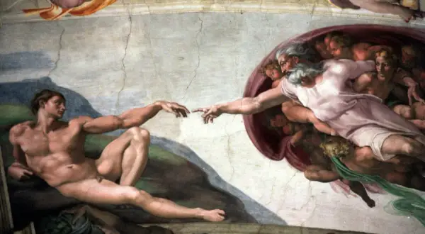 Michelangelo's "The Creation of Adam" fresco, showing God's finger reaching to Adam's.