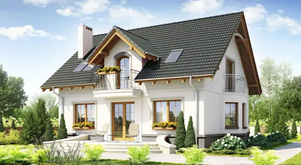 Nowy dom z pięknymi oknami i balkonem. Dbałość o detale, jak obróbka okna, podkreśla jego urok.