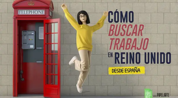 Mujer salta de alegría junto a una cabina telefónica roja en Londres, celebrando cómo buscar trabajo en el Reino Unido desde España.
