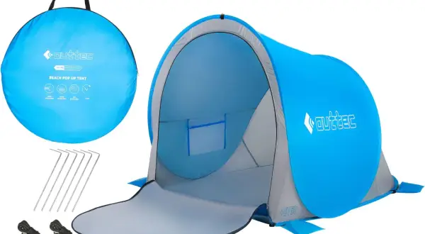 Namiot plażowy typu pop-up w kolorze niebieskim, rozłożony, z akcesoriami.