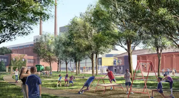 Grüne Oase mit Spielplatz und Sportgeräten auf dem Gelände der ehemaligen Zanders Papierfabrik in Bergisch Gladbach.