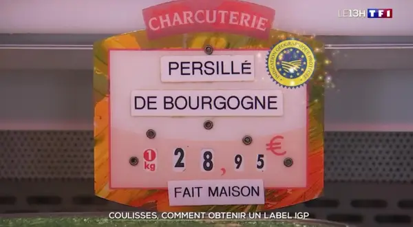 Étiquette de charcuterie "Persillé de Bourgogne" avec prix et logo IGP, expliquant la signification d'un label.