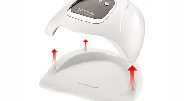 Biała lampa do paznokci hybrydowych SUN X15 MAX z odłączaną podstawą i czerwonymi strzałkami.