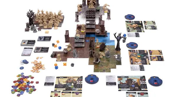 Figurki i plansza do gry planszowej "Descent: Legendy Mroku". Bohaterowie walczą z potworami w mrocznych lochach.