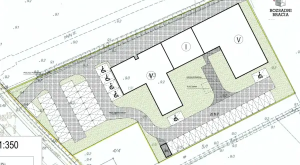 Projekt zagospodarowania terenu pod dom wielorodzinny z parkingiem, placem zabaw i drogą pożarową.