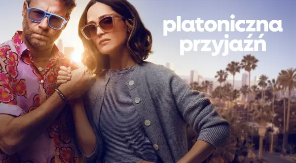 Para w okularach przeciwsłonecznych, trzymająca się za ręce, symbolizuje platoniczną miłość i przyjaźń na tle miasta.