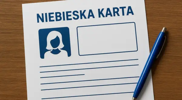Niebieska karta co to? Dokument z miejscem na zdjęcie i dane, obok niebieski długopis.