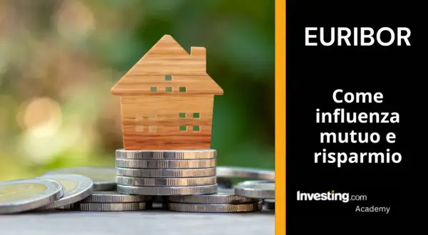 Casa in legno su monete. Euribor: cos'è e come influenza mutuo e risparmio.