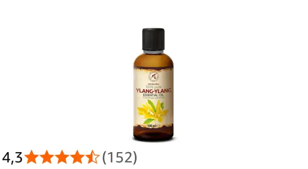 Flasche Ylang-Ylang ätherisches Öl. Die positive ylang ylang wirkung psyche kann durch den Duft gefördert werden.
