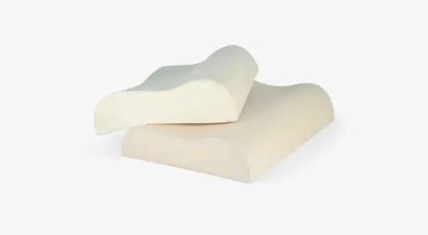 Two ergonomic pillows designed for neck pain relief. These almohadas para dolor de cuello offer contoured support for a comfortable sleep.