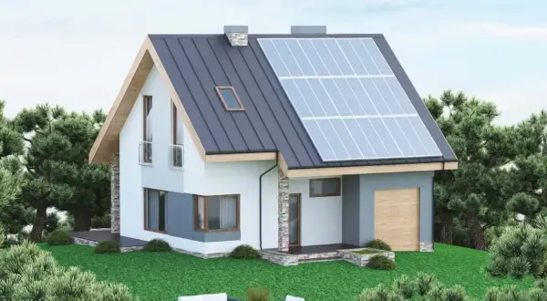 Nowoczesny dom z panelami słonecznymi na dachu. Uważaj na Columbus Energy oszuści, by nie stracić pieniędzy na fałszywych obietnicach.