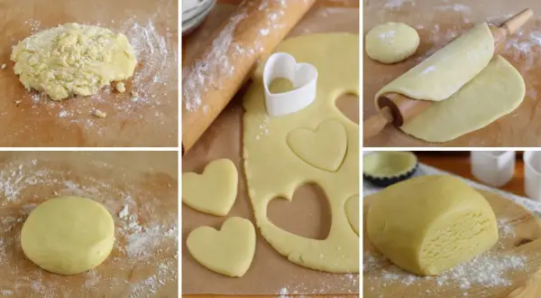 Preparazione di biscotti di pasta frolla a forma di cuore. L'impasto viene steso e tagliato con un coppapasta.