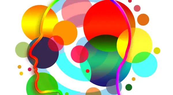 Abstract hoofdprofiel omringd door kleurrijke, overlappende cirkels, symbolisch voor hooggevoeligheid en angst.
