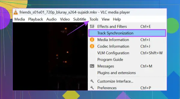 VLC media player menu with "Track Synchronization" highlighted, used to sync subtitles.