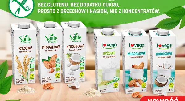Rzędy kartonów z napojami roślinnymi Sante i I love vege: ryżowe, migdałowe, kokosowe.
