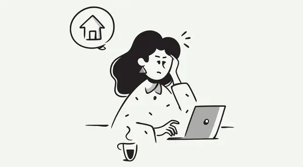Mujer preocupada frente a un portátil, pensando en un anexo de contrato de alquiler para quitar inquilino.