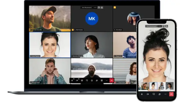 Jitsi Meet cos'è? Una videochiamata di gruppo su laptop e smartphone, con partecipanti da tutto il mondo.