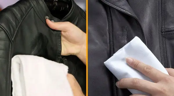 Entretien veste cuir : une main nettoie une veste en cuir noir avec un chiffon blanc.