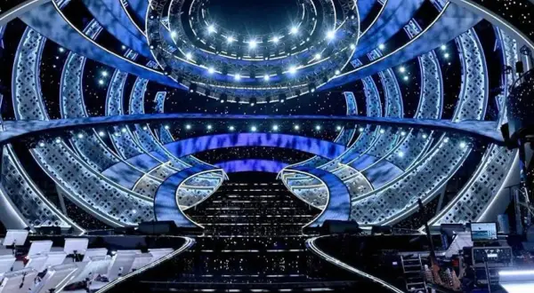 The dazzling stage for the San Remo Festival, illuminated with blue lights and starry effects, awaits its next performance.