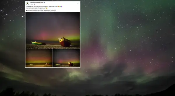 Niesamowita zorza w Polsce nad Bałtykiem, z łodziami na plaży. Zielone i fioletowe pasma tańczą na nocnym niebie.