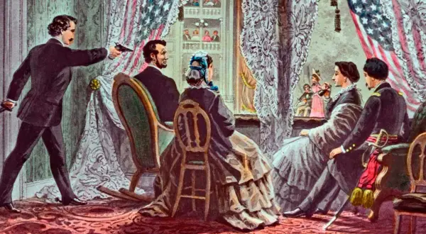 John Wilkes Booth skjuter Abraham Lincoln i teatern. Scenen visar hur dog Abraham Lincoln, en tragisk händelse i amerikansk historia.
