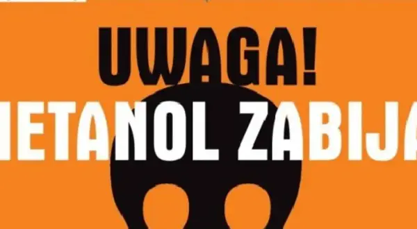 Uwaga! Metanol w winie zabija! Czarna czaszka na pomarańczowym tle ostrzega przed śmiertelnym zagrożeniem.