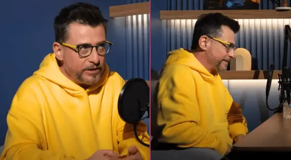 Kacper Kuszewski w żółtej bluzie z kapturem, z okularami na nosie, rozmawia przy mikrofonie. Czy ma żonę?