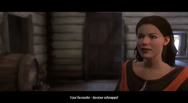 Młoda kobieta w karczmie, scena z gry Kingdom Come Deliverance. Poradnik do gry podpowiada, jak zdobyć ulubiony trunek.