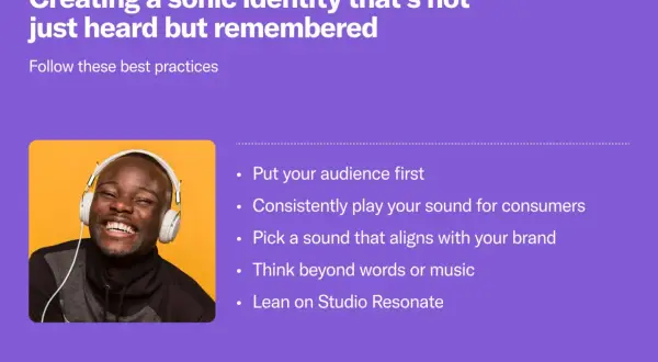 Man with headphones smiles, illustrating how to create memorable sonic branding by aligning sounds with your brand and audience.